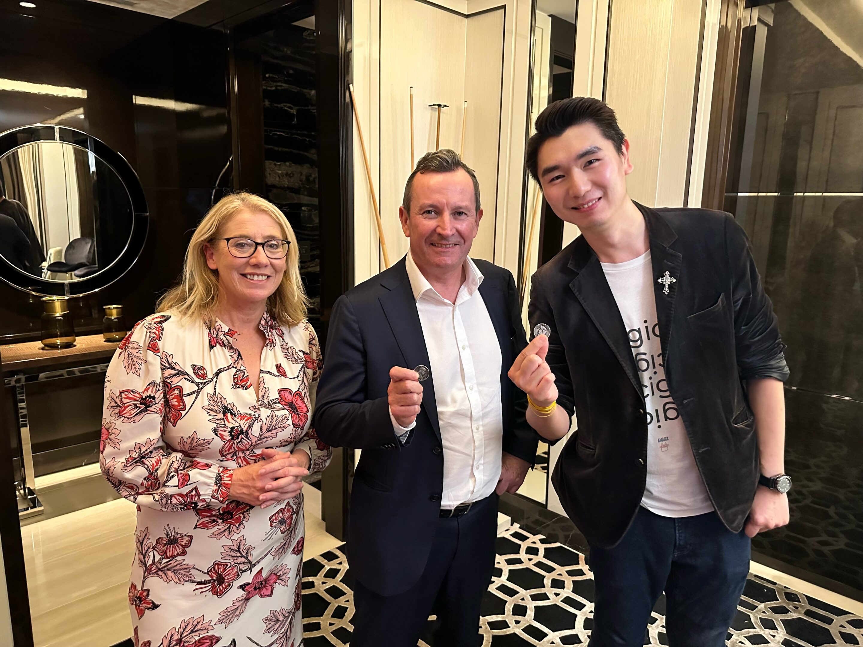 Perth magician performing close-up magic at corporate event Perth wedding magician performing live magic Perth magician entertaining guests at private party